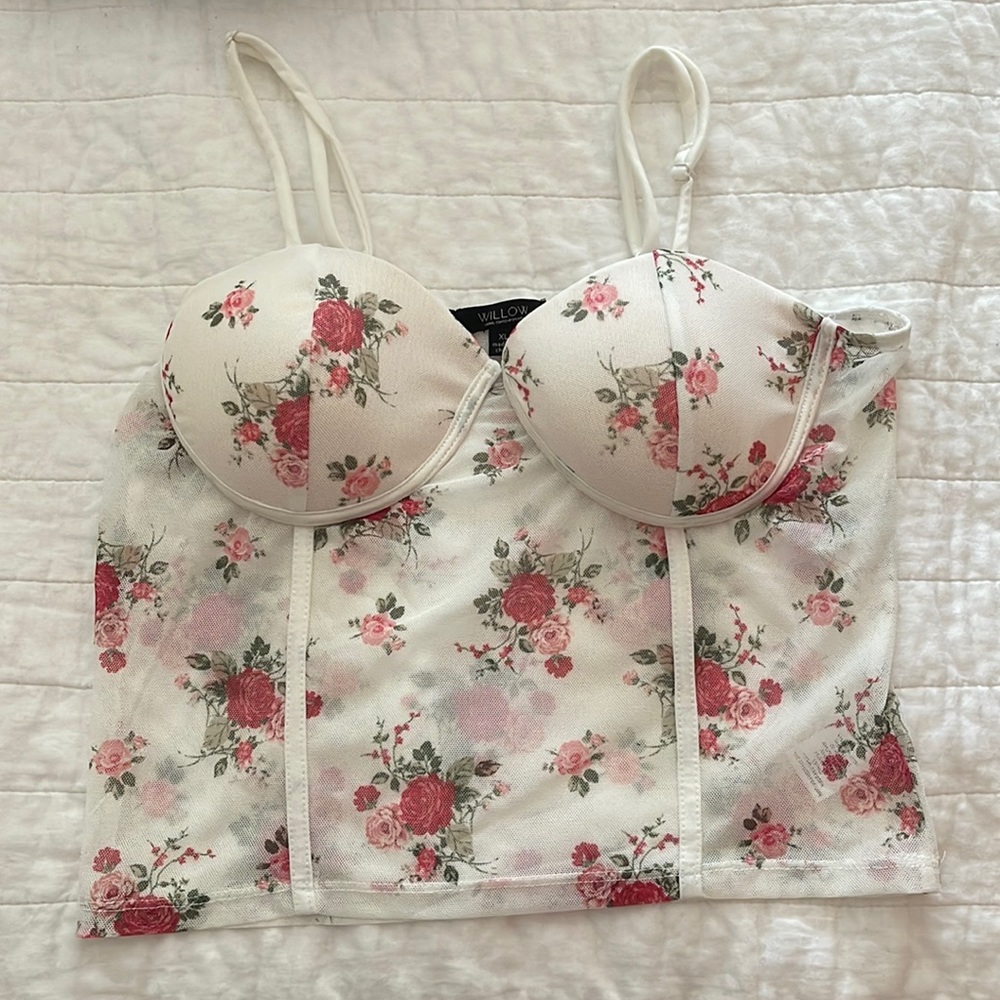 I’m selling this cute floral bustier corset top because it doesn’t fit me